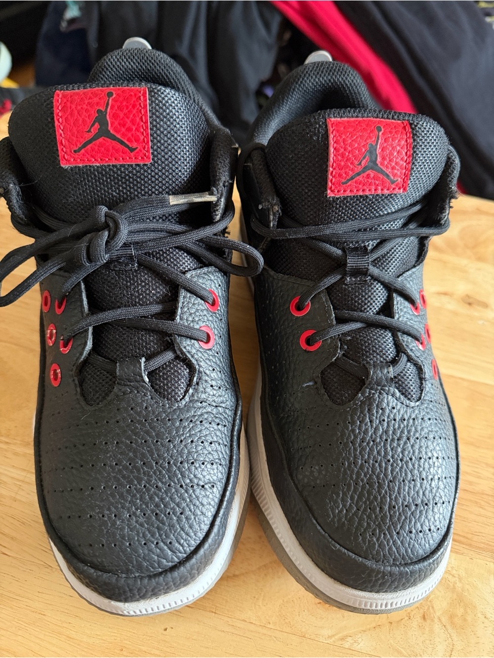 Jordan Kids Black Sneakers with Red Accents